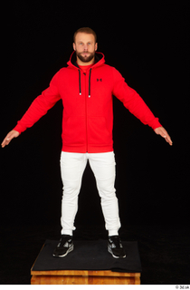 Dave black sneakers dressed red hoodie standing white pants whole…